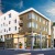 Apartments in San Jose CA - Beautiful Apartment Building with a Modern Exterior Showcasing Large Community at Dusk